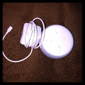 It is an Amazon Eco Dot Amazon 3